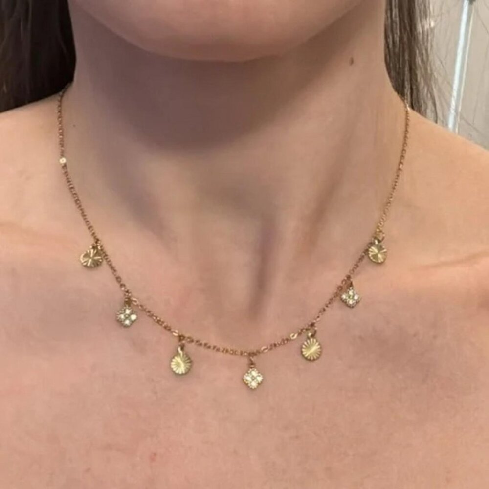 The Freda Gold stainless steel cz flowers and medallions dangling necklace